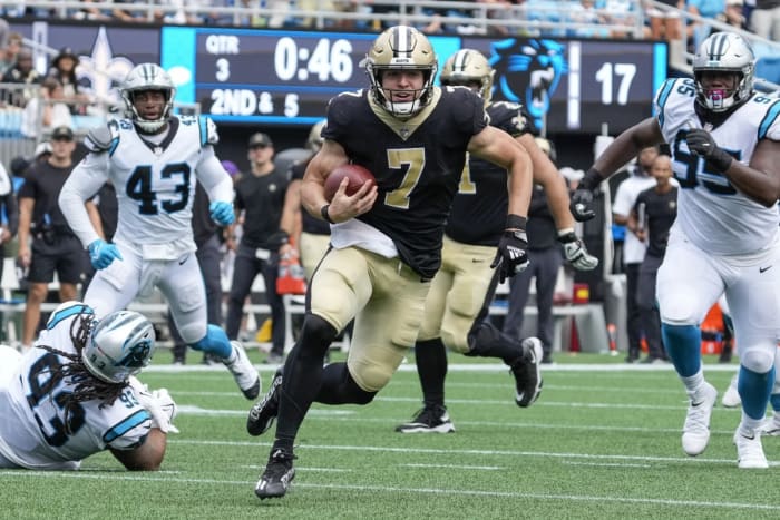 Sep 19, 2021; New Orleans Saints quarterback Taysom Hill (7) runs for yardage against the Carolina Panthers. Mandatory Credit: Jim Dedmon-USA TODAY Sports